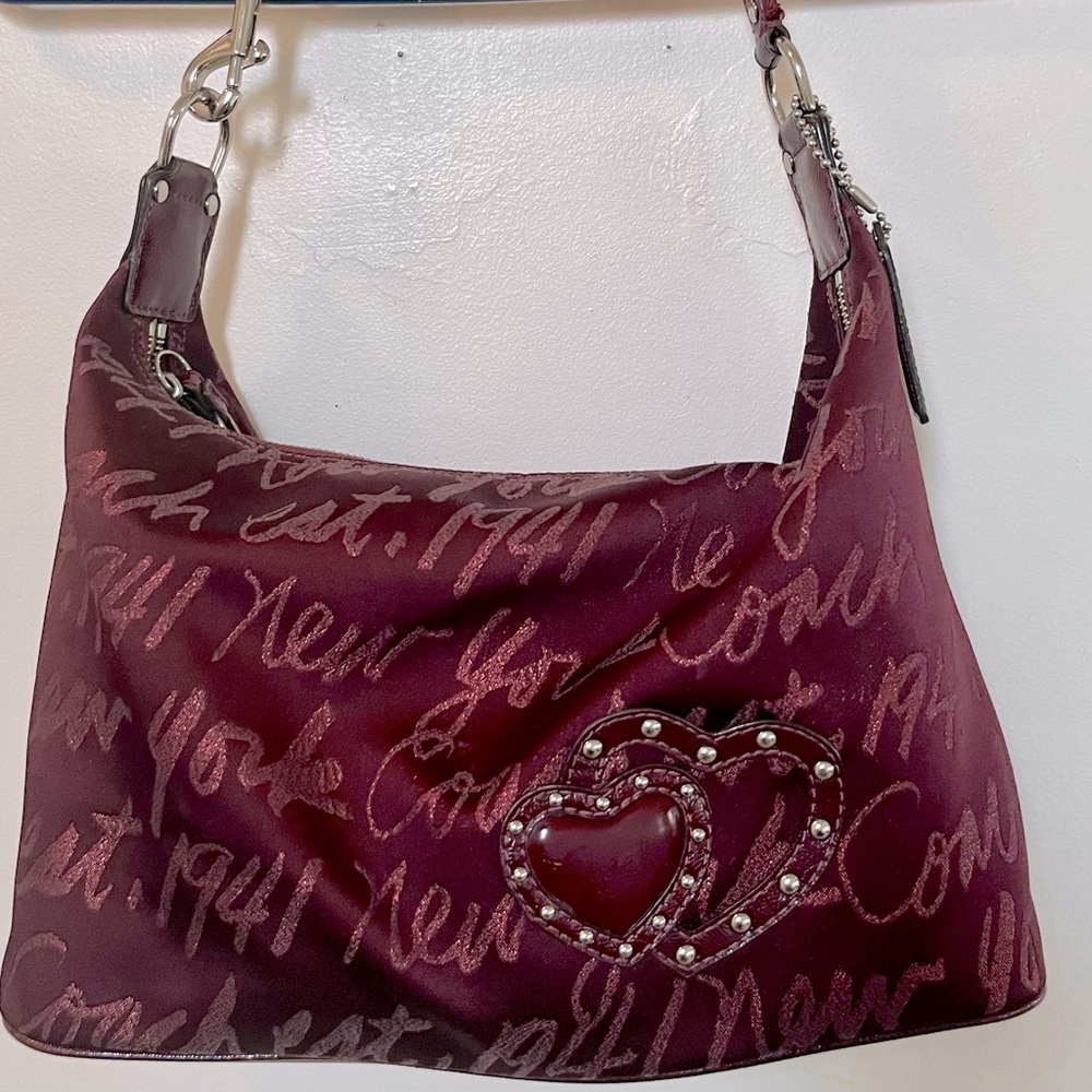 *Rare* Coach Poppy Signature Script New York Handbag. Gently used condition.